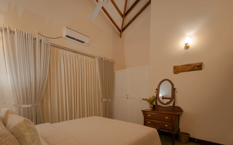 Queen guest room at Sevana Villa with tranquil balcony or garden view