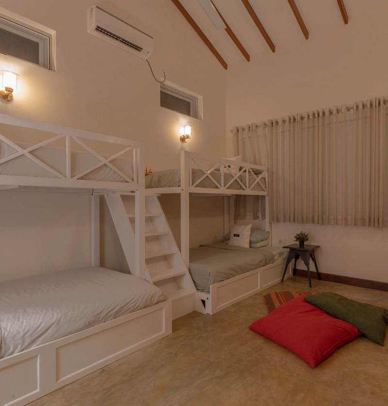 Family-friendly bunk room with four beds, playful setup, and cozy décor ideal for kids at Sevena Villa Weligama